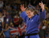 Britain's Karina Bryant celebrates after winning her women's 78kg bronze medal judo match against Ukraine's Iryna Kindzerska at the London 2012 Olympic Games August 3, 2012. REUTERS/Kim Kyung-Hoon (BRITAIN - Tags: SPORT JUDO SPORT OLYMPICS) 