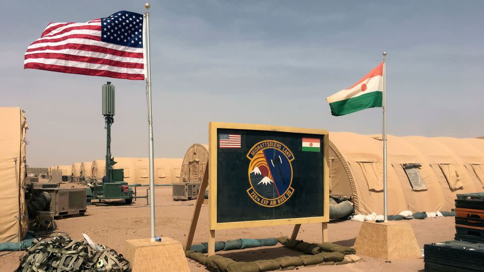 US and Niger flags are raised side by side at a base camp for air forces and other personnel in Agadez, Niger in a 2018 file photo.  - Carley Petesch/AP/File