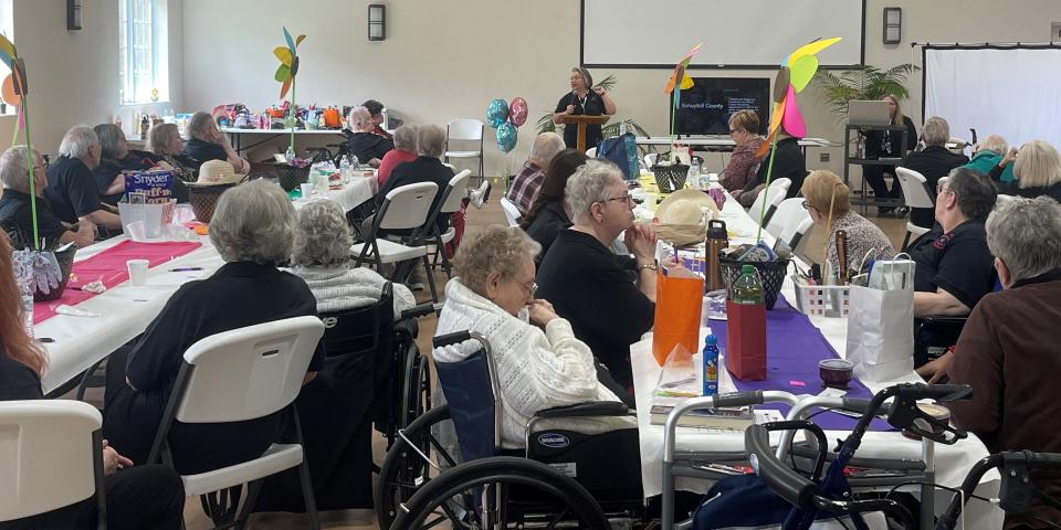 Somerset County PEER members listen as Dorrie Taylor, the state's southwest ombudsman specialist, speaks during Somerset County PEER Day on April 27.