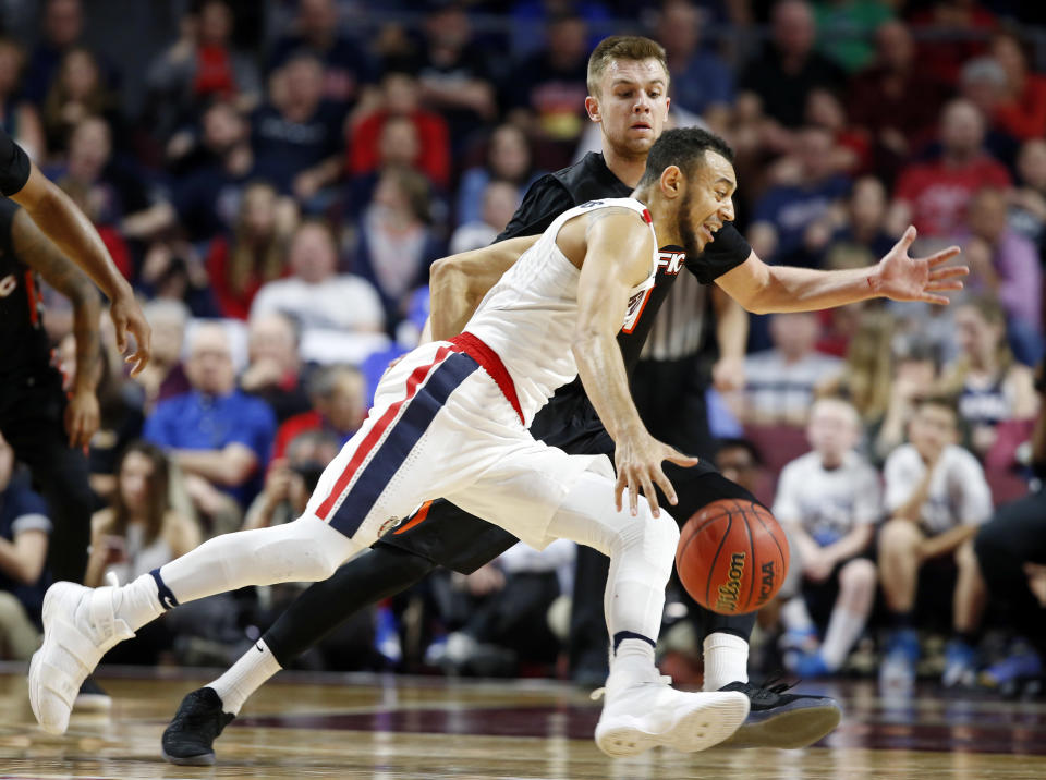 Gonzaga's Nigel Williams-Goss drives to the basket as Pacific's Jack Williams defends during the second half of a West Coast Conference tournament NCAA college basketball game Saturday, March 4, 2017, in Las Vegas. Gonzaga defeated Pacific 82-50. (AP Photo/Isaac Brekken)