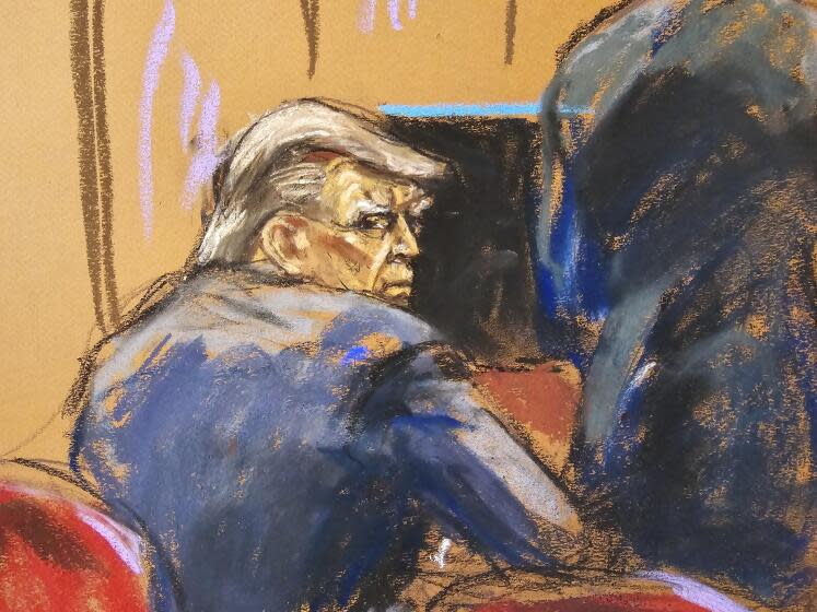 Former President Donald Trump sits as Emil Bove, a member of his legal team, argues for him before New York Supreme Court Judge Juan Merchan, during Sandoval's hearing amid Trump's criminal trial on charges that he falsified business records to conceal money paid to silence porn star Stormy Daniels in 2016, in Manhattan state court in New York, Friday, April 19, 2024, in this courtroom sketch. (Jane Rosenberg via AP, Pool)