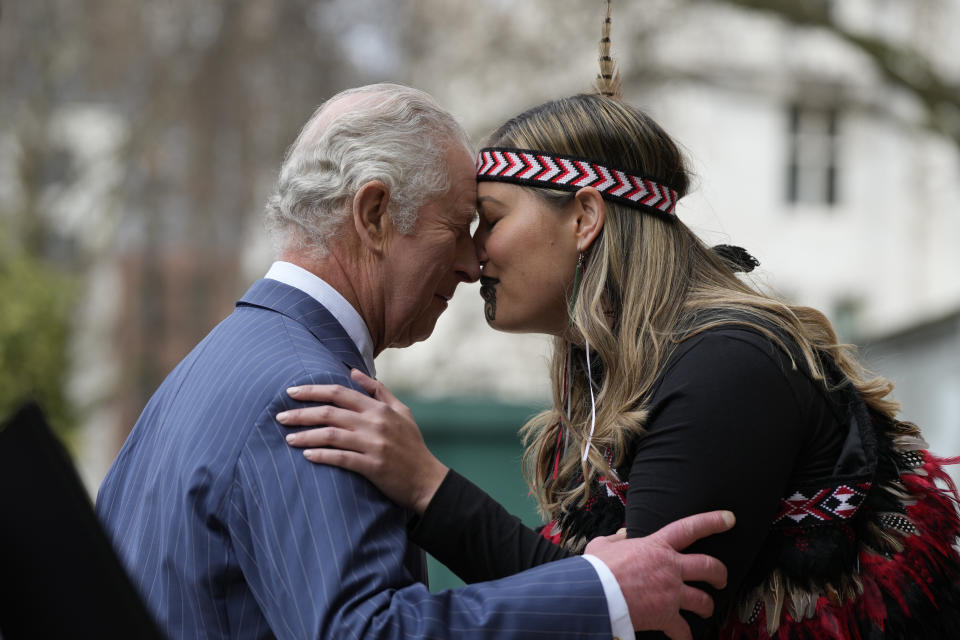 FILE - Britain's King Charles III is greeted by a member of a Maori group as he arrives to attend the annual Commonwealth Day service at Westminster Abbey in London, Monday, March 13, 2023. (AP Photo/Frank Augstein, File)