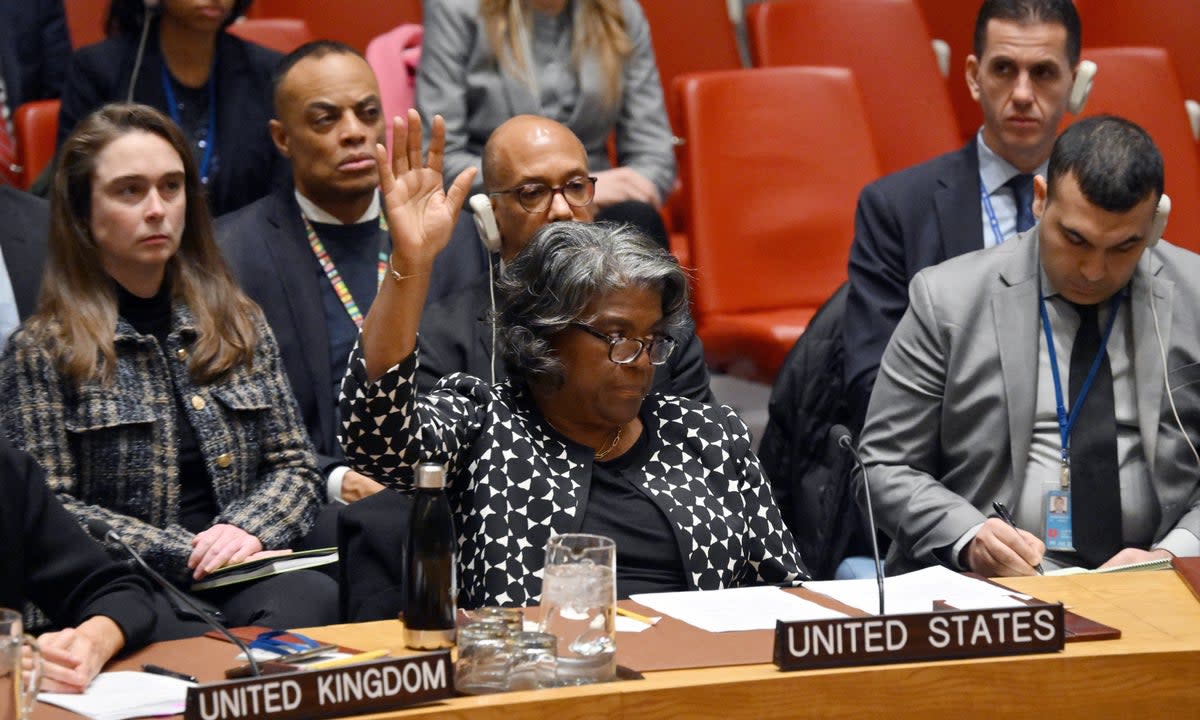 US Ambassador the UN Linda Thomas-Greenfield raises her hand at a February meeting, vetoing a ceasefire resolution (AFP via Getty Images)