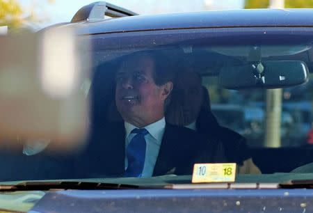 Former Trump 2016 campaign chairman Paul Manafort (L) leaves U.S. Federal Court after being arraigned on twelve federal charges in the investigation into alleged Russian meddling in the 2016 U.S. presidential election in Washington, U.S. October 30, 2017. REUTERS/James Lawler Duggan