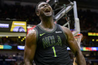 New Orleans Pelicans forward Zion Williamson (1) reacts after a basket against the Los Angeles Clippers during the second half of an NBA basketball game Friday, March 15, 202, in New Orleans. (AP Photo/Matthew Hinton)