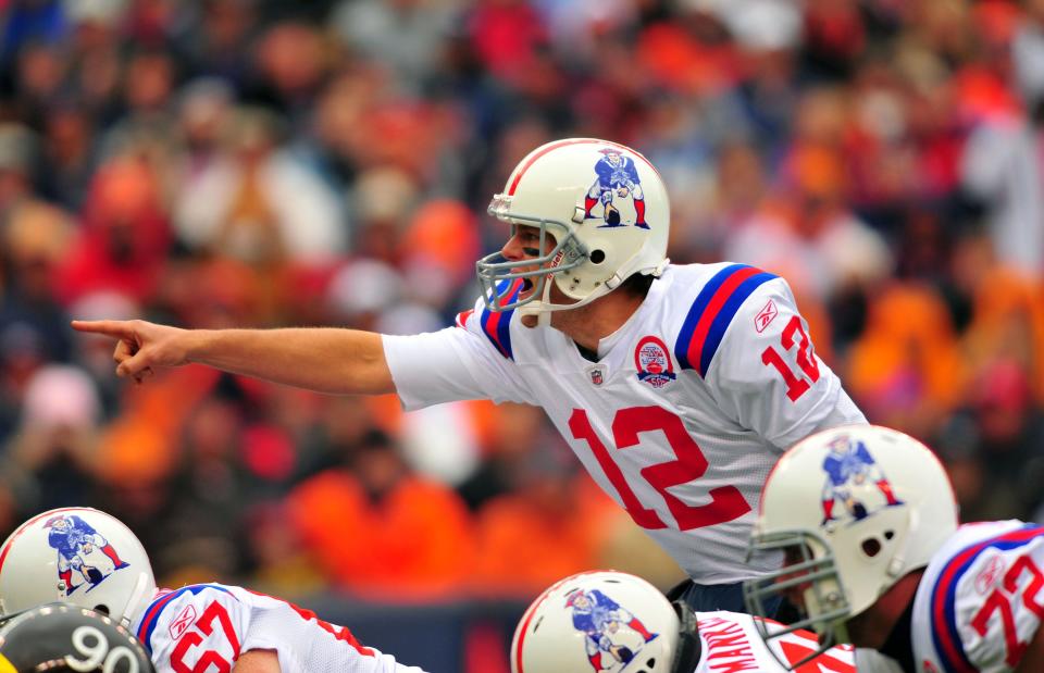 Quarterback Tom Brady led the Patriots to nine Super Bowls and six titles.