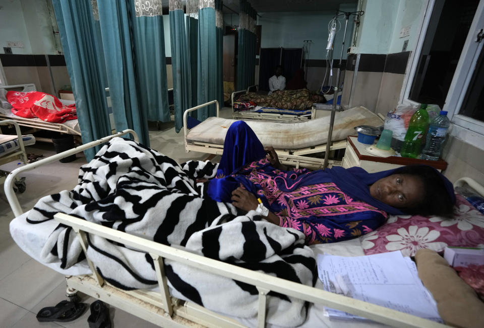 A woman rests in the cardiac ward of a hospital in Karachi, Pakistan, Thursday, Jan. 19, 2023. Pakistan has considerable control over infectious diseases but now struggles against cardiovascular diseases, diabetes and cancer as causes of early deaths, according to a new study published Thursday. (AP Photo/Fareed Khan)