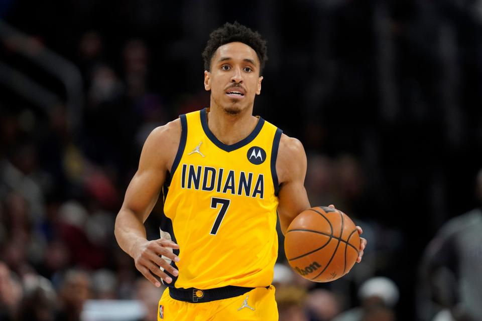 FILE - Indiana Pacers guard Malcolm Brogdon plays against the Detroit Pistons in the second half of an NBA basketball game in Detroit, on March 4, 2022. The Boston Celtics improved its backcourt depth Friday, July 1, 2022, by acquiring combo guard Malcolm Brogdon in a trade with the Indiana Pacers, a person familiar with the deal told The Associated Press.   (AP Photo/Paul Sancya, File)