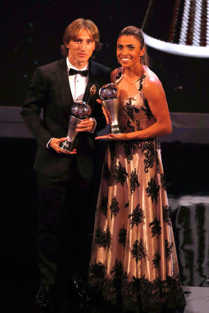 Soccer Football - The Best FIFA Football Awards - Royal Festival Hall, London, Britain - September 24, 2018 Luka Modric and Marta pose with their awards Action Images via Reuters/John Sibley