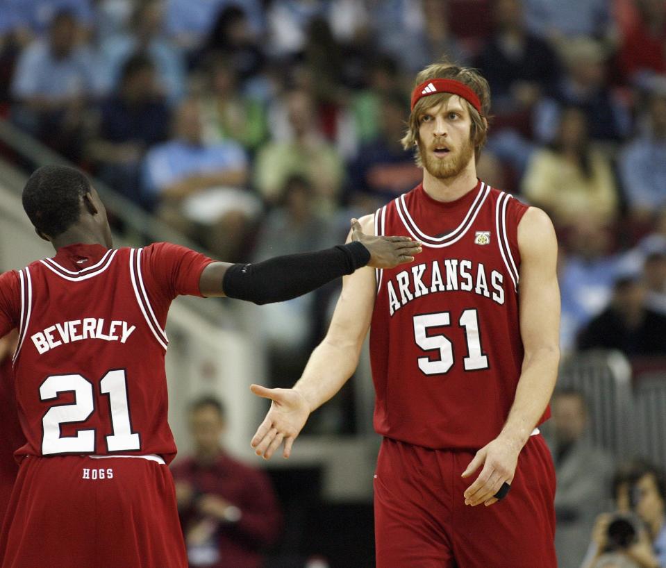 RALEIGH,NC – MARCH 21: Patrick Beverley #21 celebrates with Steven Hill #51 of the Arkansas Razorbacks against the <a class="link " href="https://sports.yahoo.com/ncaaw/teams/indiana/" data-i13n="sec:content-canvas;subsec:anchor_text;elm:context_link" data-ylk="slk:Indiana Hoosiers;sec:content-canvas;subsec:anchor_text;elm:context_link;itc:0">Indiana Hoosiers</a> during the 1st round of the 2008 NCAA Men’s Basketball Tournament on March 21, 2008 at RBC Center in Raleigh, North Carolina. (Photo by: Kevin C. Cox/Getty Images)