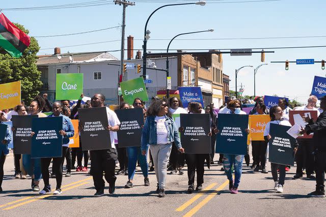 <p>Wegmans</p> Wegmans employees share a message of love at a Juneteenth parade in Buffalo in the wake of the 2022 shooting.
