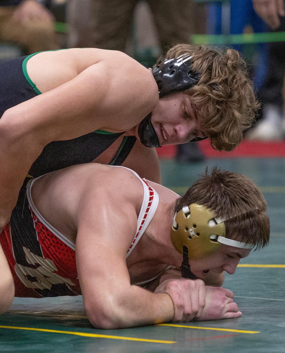 Brick Memorial's Ben Szuba (top) won the Mustang Classic 215-pound championship Wednesday.