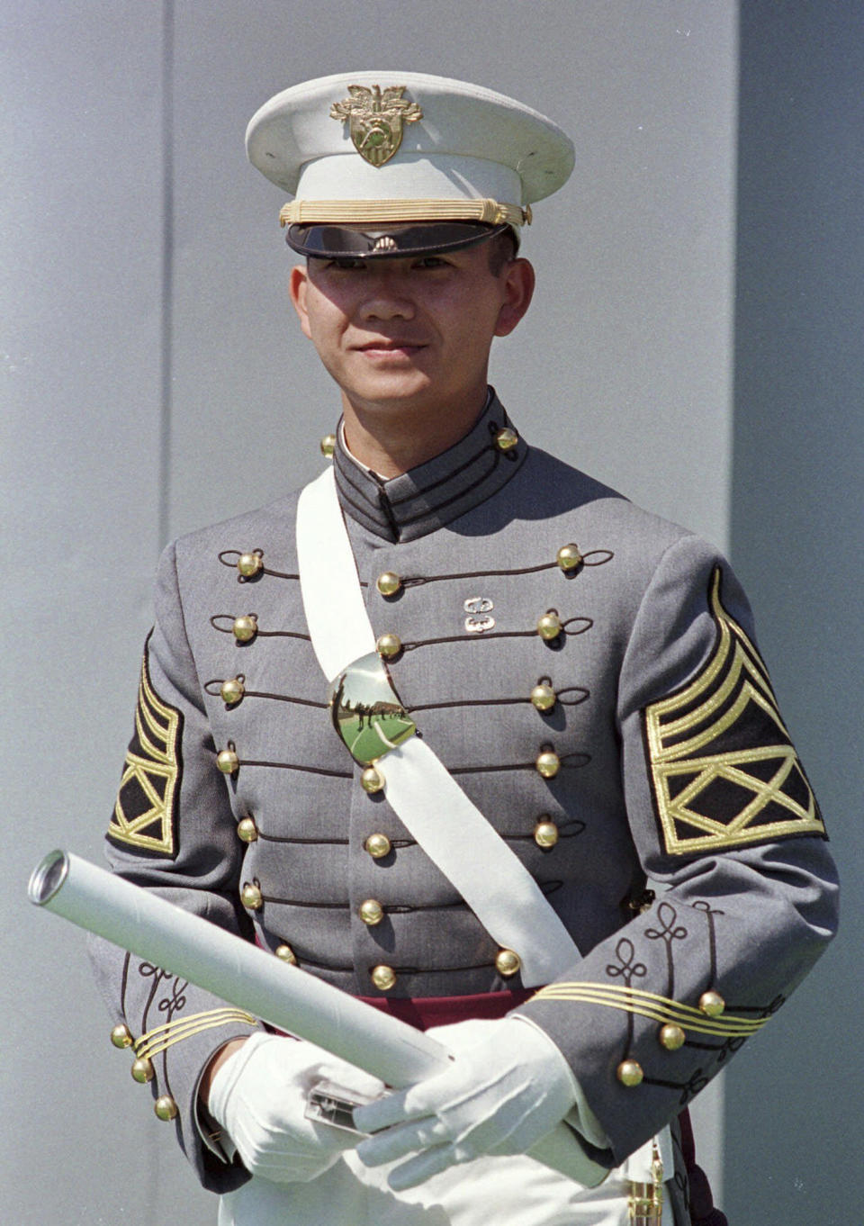 FILE - Hun Manet, the first Cambodian to graduate from the United States Military Academy, holds his diploma on May 29, 1999, after he received it from the military academy at West Point, N.Y. Cambodia's Hun Sen says he is ready to hand the premiership to his oldest son, Hun Manet, who heads the country’s army. (AP Photo/Ken Bizzigotti, File)