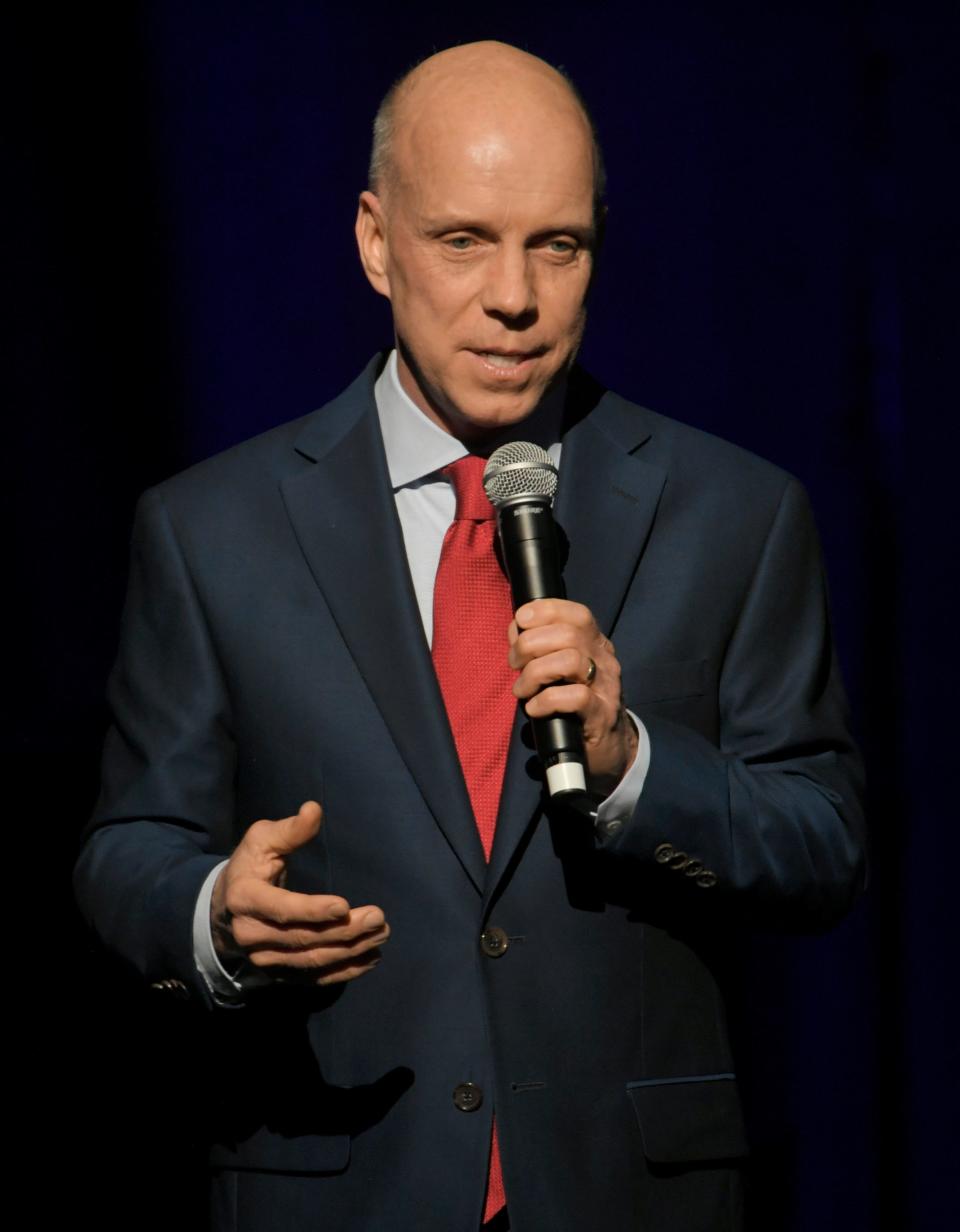 Scott Hamilton speaks to the crowd at the inaugural worship service at Grand Ole Opry House in Nashville on Saturday, Jan. 19, 2019. 