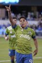 Seattle Sounders forward Raul Ruidiaz points to the crowd after scoring a goal on a penalty kick against the San Jose Earthquakes during the first half of an MLS soccer match Wednesday, Sept. 29, 2021, in San Jose, Calif.(AP Photo/Tony Avelar)