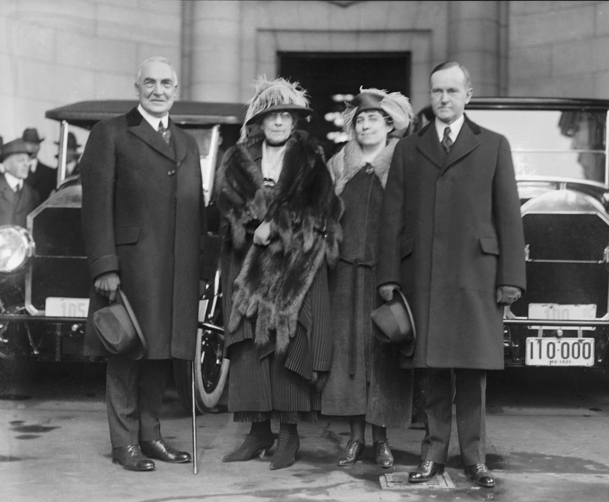 (Left to right) Warren G. Harding, wife Florence Harding, Grace Coolidge and husband Calvin Coolidge arrive at the 1921 inauguration. Harding was sworn in as president, Coolidge as vice president.