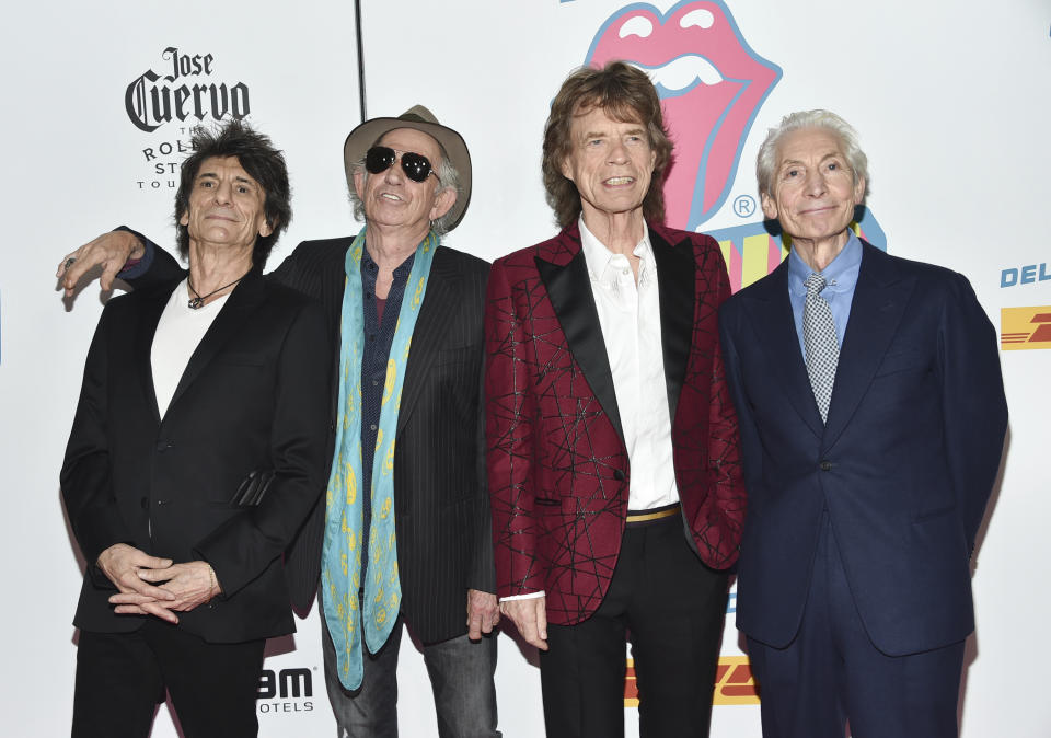 FILE - In this Nov. 15, 2016 file photo, The Rolling Stones, from left, Ronnie Wood, Keith Richards, Mick Jagger and Charlie Watts attend the opening night party for "Exhibitionism" in New York. The Rolling Stones will be rolling through the U.S. next year. The band says it is adding a 13-show leg to its No Filter tour in spring 2019, kicking off in Miami on April 20. (Photo by Evan Agostini/Invision/AP)