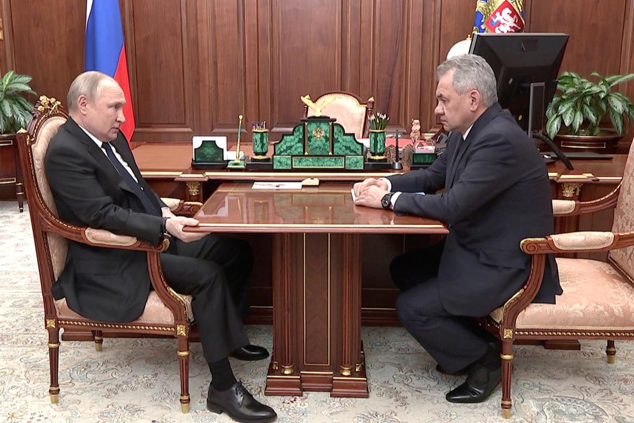 Russian President Vladimir Putin and Russian Defense Minister Sergei Shoigu.