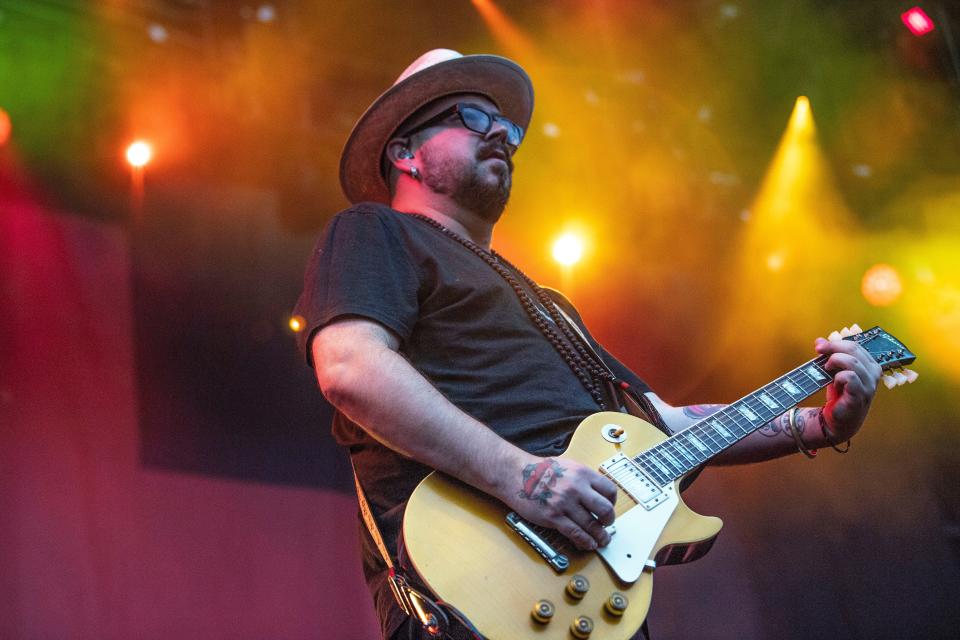 Live guitarist Chad Taylor performs at Hersheypark Stadium during the band's 2018 tour  with Counting Crows. Taylor hasn't played with Live since 2019 and now, after some bleak years of legal difficulties, is getting back to music, his salvation, he says.