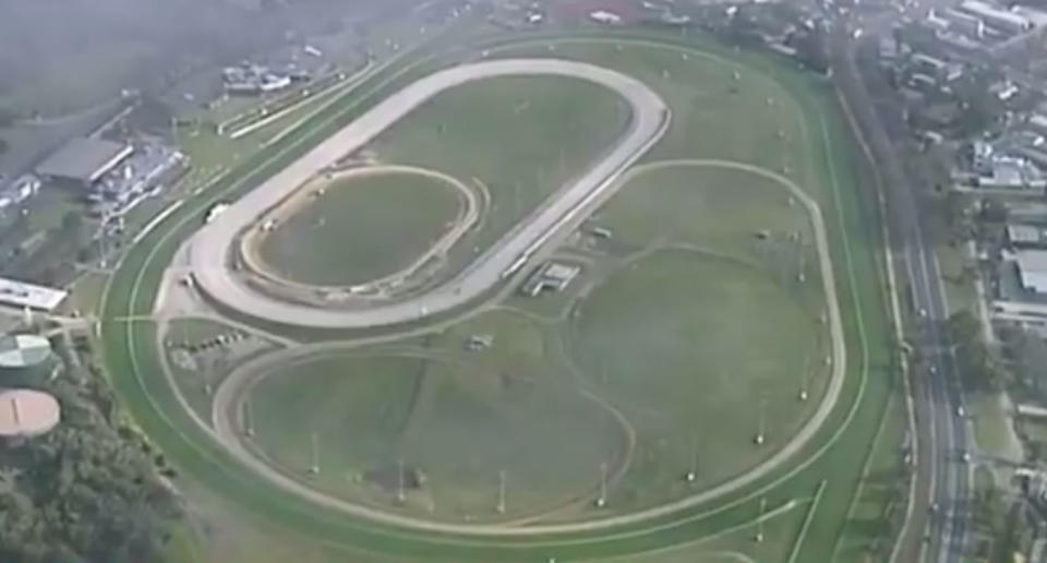 Cranbourne Racecourse is pictured from the sky. A 22-year-old woman died here after falling from a horse on Friday about 4.35am.