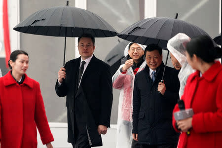 Tesla CEO Elon Musk and Shanghai's Mayor Ying Yong attend the Tesla Shanghai Gigafactory groundbreaking ceremony in Shanghai, China January 7, 2019. REUTERS/Aly Song