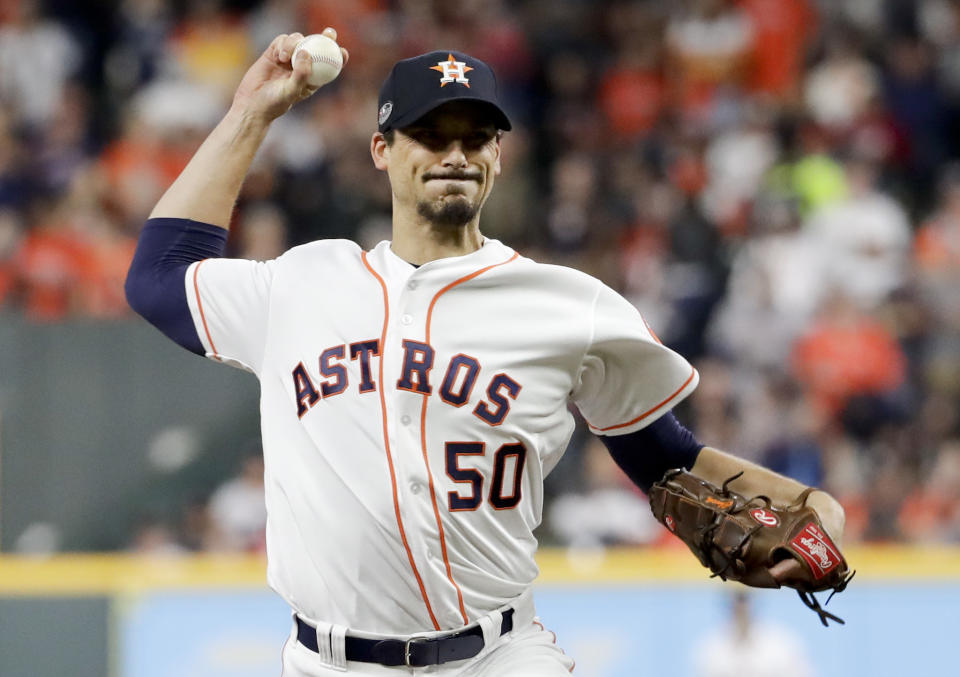 FILE - In this Wednesday, Oct. 17, 2018 file photo, Houston Astros starting pitcher Charlie Morton throws against the Boston Red Sox during the first inning in Game 4 of a baseball American League Championship Series in Houston. A person familiar with the agreement tells The Associated Press that All-Star pitcher Charlie Morton and the Tampa Bay Rays have reached a $30 million, two-year deal. The person spoke on condition of anonymity Wednesday, Dec. 12, 2018 because the contract has not been officially announced. (AP Photo/Frank Franklin II, File)