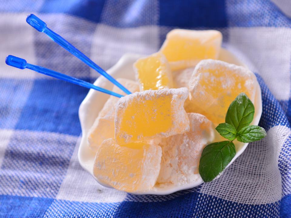 bowl of yellow traditional greek or turkish sweet delight