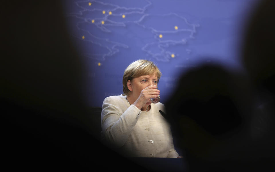 German Chancellor Angela Merkel pauses before speaking during a media conference at an EU summit in Brussels, Thursday, Oct. 18, 2018. EU leaders met for a second day on Thursday to discuss migration, cybersecurity and to try and move ahead on stalled Brexit talks. (AP Photo/Francisco Seco)