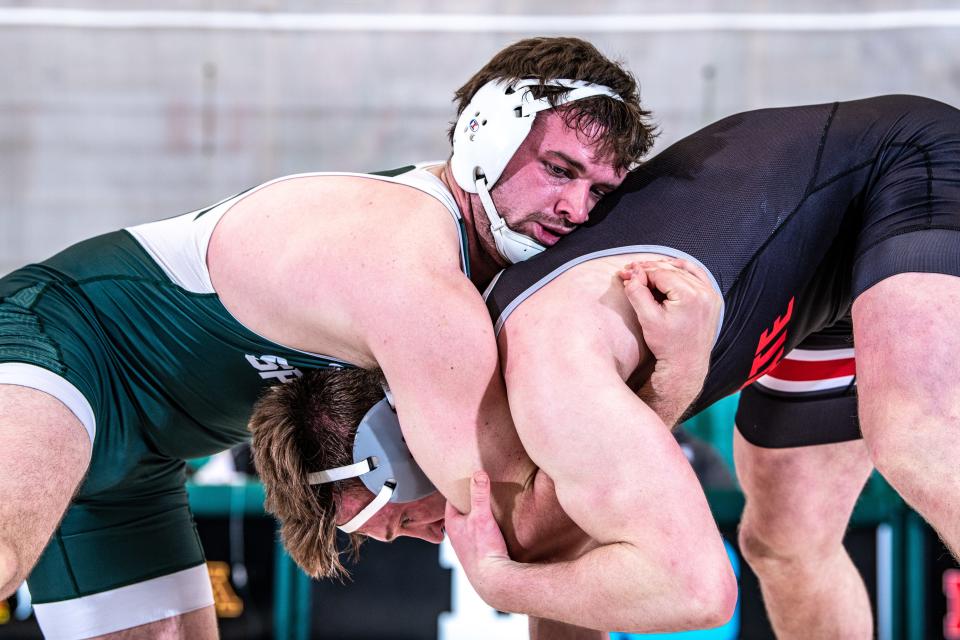 Brad Wilton has moved up to heavyweight division for 17th-ranked Michigan State, filling in at a key spot, despite being outweighed by 30 or so pounds every match.