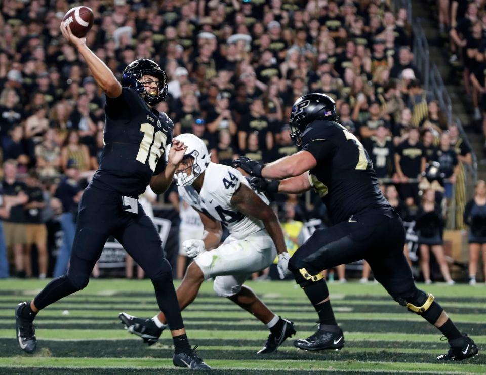 Purdue Boilermakers quarterback Aidan O'Connell (16) passes the ball during the NCAA football game against the Penn State Nittany Lions, Thursday, Sept. 1, 2022, at Ross-Ade Stadium in West Lafayette, Ind. 
