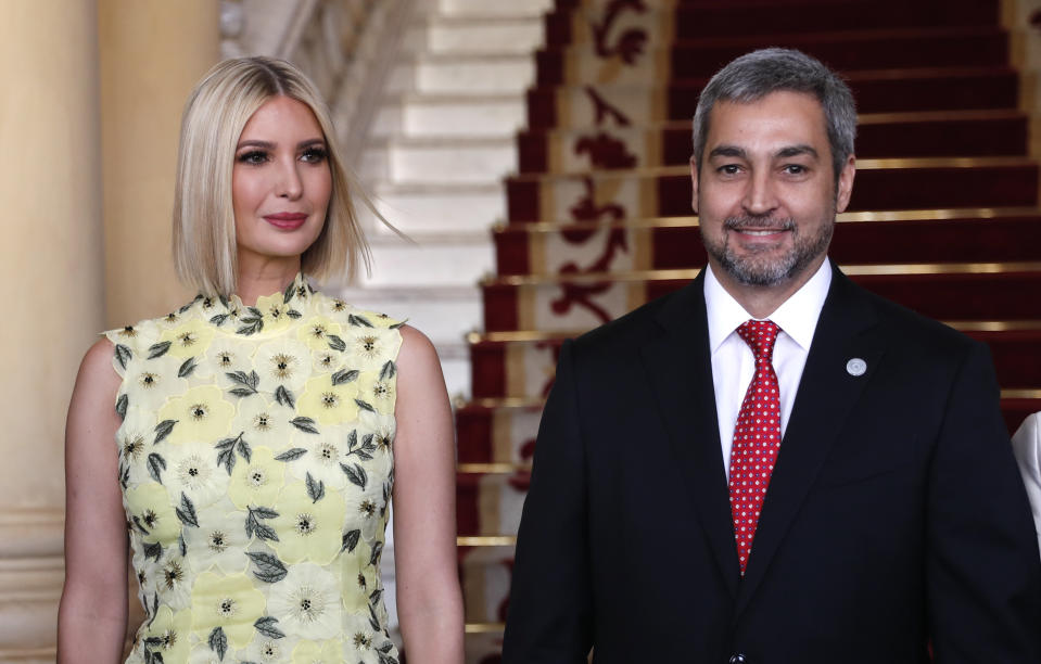 Ivanka Trump, President Donald Trump's daughter and White House adviser, and Paraguay's President Mario Abdo Benitez, pose for photos at Presidential Palace in Asuncion, Paraguay, Friday, Sept. 6, 2019. Ivanka Trump is on her third stop of a South American trip to promote women's empowerment. (AP Photo/Jorge Saenz)