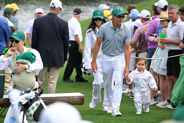 <p>Ben Jared/PGA TOUR via Getty</p> Rickie and Maya Fowler and Allison Stokke on April 10, 2024 in Augusta, Georgia.