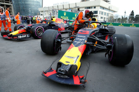 Formula One - F1 - Azerbaijan Grand Prix - Baku City Circuit, Baku, Azerbaijan - April 29, 2018 The cars of Red Bull's Daniel Ricciardo and Max Verstappen after crashing out during the race REUTERS/David Mdzinarishvili