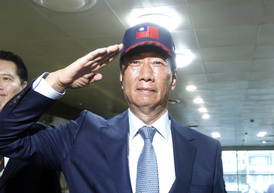 Terry Gou, the head of the world's largest electronics supplier Foxconn, poses for a photo before meeting with Nationalist Party chairman Wu Den-yih at the party headquarters in Taipei, Taiwan, Monday, May 13, 2019. Gou plans to run for president of Taiwan, bringing his pro-business and pro-China policies to what is expected to be a crowded field for next year's election. (AP Photo/Chiang Ying-ying)