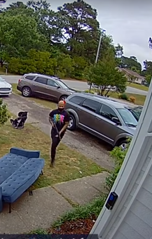 A Ring doorbell camera captured this image of Calvin Locklear, carrying a long rifle and running into a Milton Drive home, during a deadly home invasion June 5, 2021. Locklear pleaded guilty Thursday to second-degree murder in the death of homeowner Justin Jackson.
