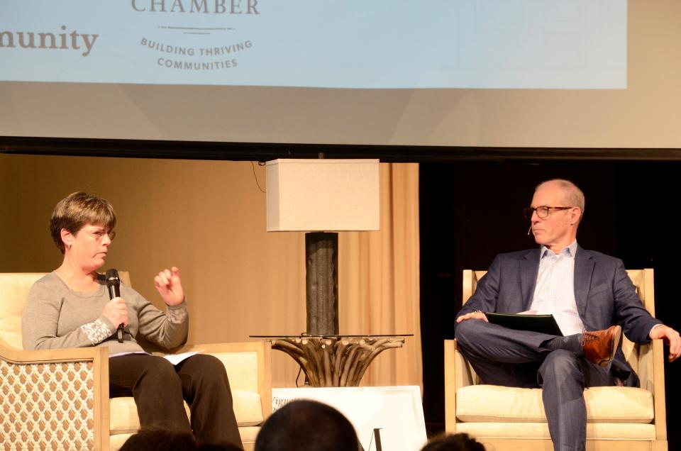 (From left) Tammy Doernenburg, director of planning and zoning for Emmet County, is interviewed by Dan Ledingham on Friday, Feb. 3, 2023 during the Petoskey State of the Community.