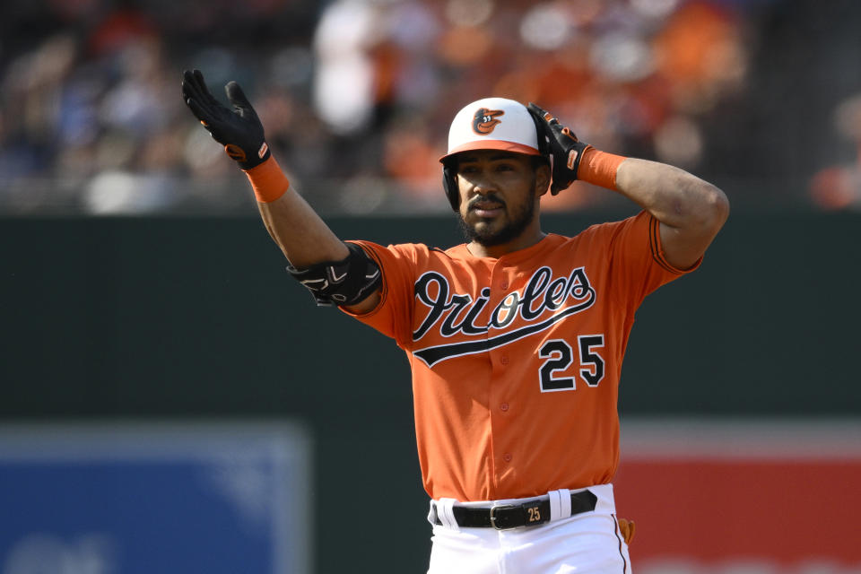 Baltimore Orioles' Anthony Santander gestures at second base after his double during the fifth inning of a baseball game against the Kansas City Royals, Saturday, June 10, 2023, in Baltimore. (AP Photo/Nick Wass)