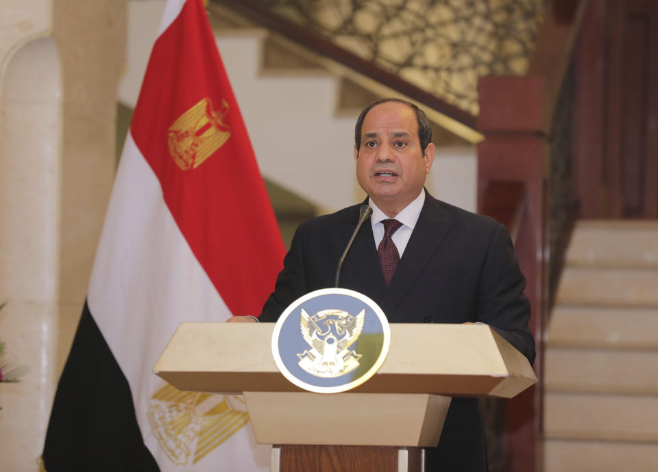 Egyptian President Abdel Fattah al-Sisi holds a news conference with the Chairman of the Sovereignty Council of Sudan Gen. Abdel Fattah Abdelrahman al-Burhan at the Presidential Palace in Khartoum, Sudan, Saturday, March. 6, 2021. Egypt's presidency says President Abdel Fattah el-Sissi trip was to address an array of issues, including economic and military ties and the two nations’ dispute with Ethiopia over a massive dam Addis Ababa is building on the Blue Nile. The visit comes amid a rapprochement between the two governments. (Presidency of Sudan via AP)