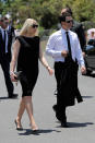 Former Test captain Ricky Ponting and wife Rianna Cantor pay their respects.