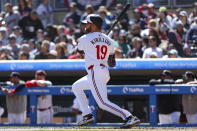 Minnesota Twins' Alex Kirilloff (19) hits an RBI triple during the first inning of a baseball game against the Cleveland Guardians, Saturday, April 6, 2024, in Minneapolis. (AP Photo/Matt Krohn)