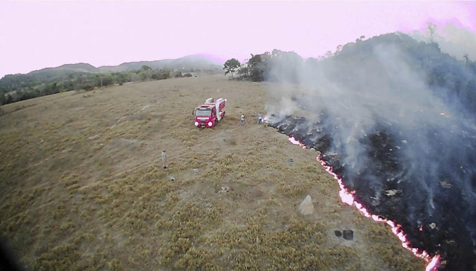 In this Aug. 20, 2019 drone photo released by the Corpo de Bombeiros de Mato Grosso, brush fires burn in Guaranta do Norte municipality, Mato Grosso state, Brazil. Brazil's National Institute for Space Research, a federal agency monitoring deforestation and wildfires, said the country has seen a record number of wildfires this year. (Corpo de Bombeiros de Mato Grosso via AP) (Photo: Corpo de Bombeiros de Mato Grosso via ASSOCIATED PRESS)