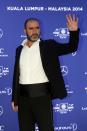 Former soccer player Eric Cantona arrives for the Laureus Sports Awards in Kuala Lumpur March 26, 2014. REUTERS/Samsul Said (MALAYSIA - Tags: SPORT SOCCER)