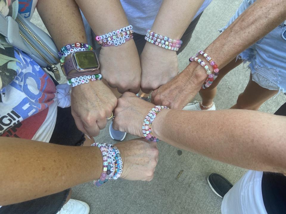 Selena Mallinger, Jen Vansickel, Jana Hunter and Teresa Phillips all wore friendship bracelets at the New Kids on the Block concert on Aug. 12 at the Iowa State Fair.