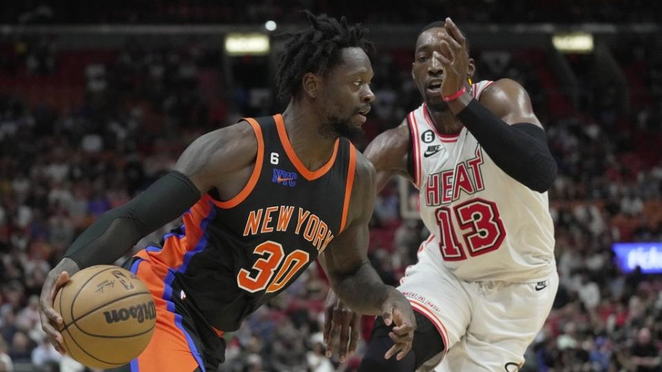 York Knicks forward Julius Randle drives past Miami Heat center Bam Adebayo.