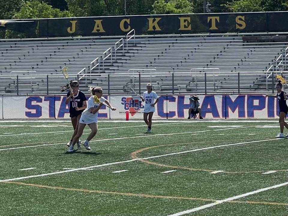 Fort Mill senior attacker Taylor Wilcox makes a run in the 5A Girls Lacrosse State Championship Game April 27.