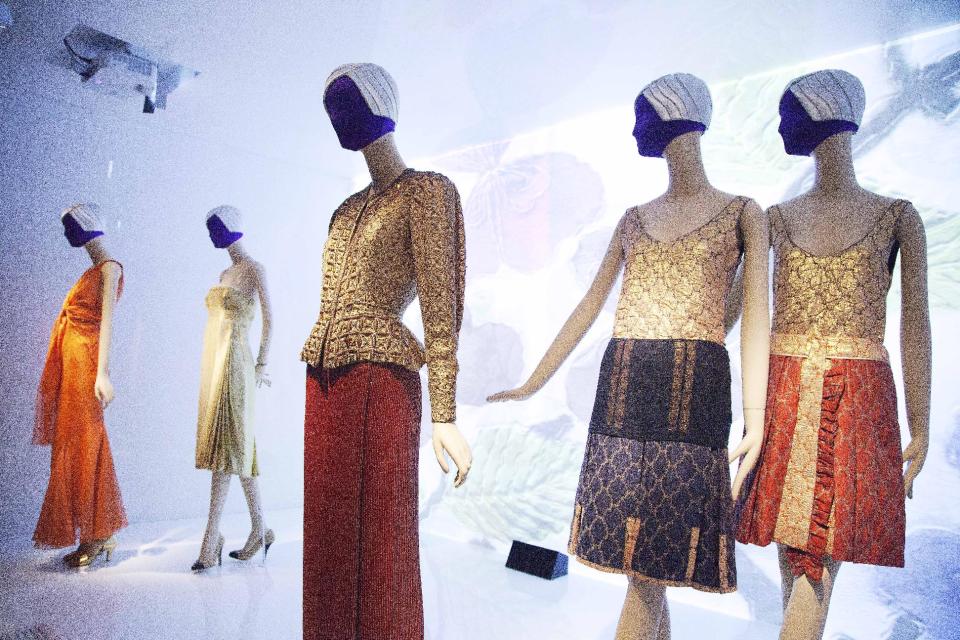 Fashions by Miuccia Prada and Elsa Schiaparelli are on display at the Metropolitan Museum of Art, Monday, May 7, 2012 in New York. The show "Schiaparelli and Prada, Impossible Conversations," opens May 10 and continues through Aug. 19. (AP Photo/Mark Lennihan)