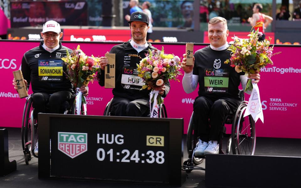 Great Britain's David Weir came in third today behind Marcel Hug (Centre) and second-placed Daniel Romanchuk (Left) - PA