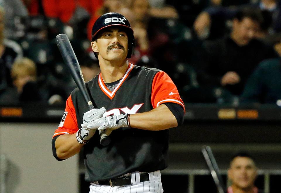 White Sox infielder Tyler Saladino takes his respect for the national anthem to another level. (Getty Images)