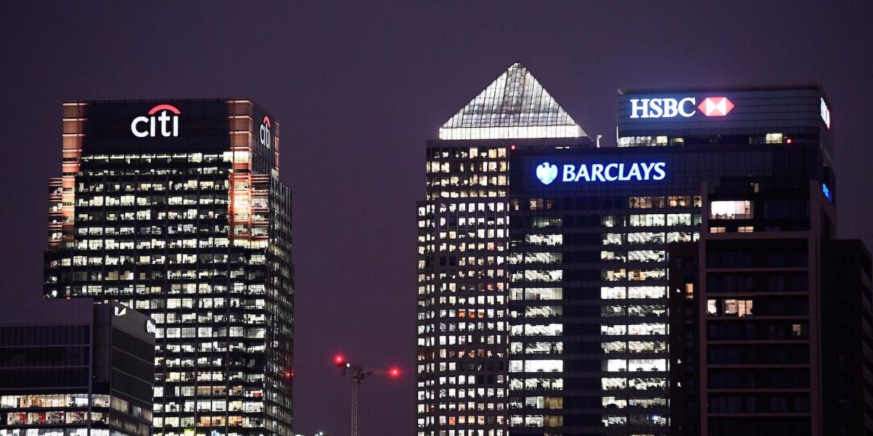 Office blocks of Citi, Barclays, and HSBC banks are seen at dusk in the Canary Wharf financial district in London, Britain November 16, 2017.