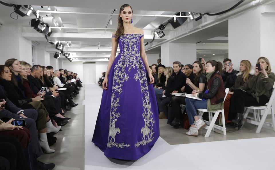 Fashion from the Oscar de la Renta Fall 2013 show is modeled during Fashion Week in New York, Tuesday, Feb. 12, 2013. (AP Photo/Kathy Willens)